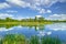 Spring summer landscape blue sky clouds river pond green trees