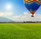 Spring sun Hot air balloons green field