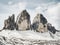 Spring trek around the Tre Cime above snowy landscape. Sunny April evening, view from tour around at sunset, Dolomite Alps Italy