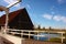 Spring trip to Zaanse Schans. Placid channels, tranquil rivers flow between the hills. The Dutch windmills stand as a traditional