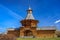 Spring view of the wooden Travel Tower of the Nikolo-Korelsky Monastery in the Kolomenskoye Museum at sunny day