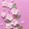 Spring white flowers and light green leaves on textural pink paper. Spring background for design and decoration