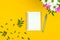 Spring workplace mockup with blank notepad, bouquet with flowers, background for 8 march, women`s day, mother`s day, holidays