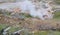 Spring in Yellowstone: Blood Geyser Erupts in Artists' Paintpots at the Foot of Paintpot Hill in the Gibbon Geyser Basin