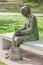 Springfield Missouri, USA- May 18, 2014. Reading woman statue in