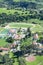 Springtime aerial view of Villanova Prep school with track, pool, baseball diamond, tennis courts and campus in view, Ojai, CA