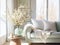 Springtime home decor in white color, spring interior decorations with early flowers, cozy sofa and big windows