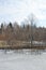 Springtime Wetland Forest. Early Spring With Melting Ice And Snow