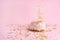 Sprinkle pink donut. on a pink background with space for design. Banner