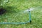 Sprinkle spray water to lawn field