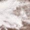 Sprinkled wheat flour on wooden table, crop
