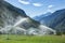 Sprinkler system watering pasture