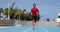 Sprinter runner athlete man sprinting training on athletics track and field