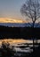 Sprintime sunset silhouette on a Muskoka Pond