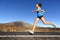 Sprinting running woman - female runner training