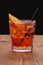 Spritz aperitif - orange cocktail with ice cubes