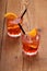 Spritz aperitif, two orange cocktail with ice cubes