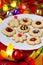 Spritz cookies filled with jam and decoration for