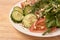 Sprouted beans. Tomato and cucumber. Fresh salad. White plate