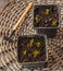 Sprouts muscari in pots for forced flowering in the gray table. flat lay