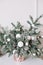 Spruce branches with ornaments. Vase with fir branches bouquet. Christmas decoration. Winter, New Year, Christmas concept.