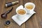 Spyglass, Compass, Smoking Pipe and Two White Espresso Coffee Cu