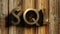 SQL brass write on wooden background - 3D rendering