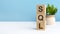 sql - word from wooden blocks with letters, blue background. copy space available