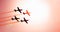 Squad of four airplanes flying together passing in front of the