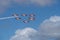 Squadron of military airplanes in team maneuver