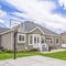 Square Basketball court and swings on the spacious yard of a single storey family home