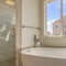 Square Bathtub and separate shower inside the bathroom of a new home