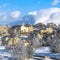 Square Beautiful houses on a snowy mountainside residential community in winter