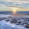 Square Beautiful sunrise in Draper Utah with snowy hills lake and houses in winter