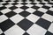 Square black and white tiles floor