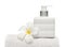 Square bottle soap and flower on white towel white background