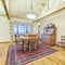 Square Bright, open and warm dining room with vaulted ceilings and rug