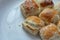 Square butter cookies in a white plate. Bakery cookies in square shape