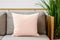 Square canvas pillow mockup on grey sofa, small cotton cushion mockup in living room interior