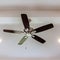 Square Ceiling fan with wood blades and built in lights on the ceiling beam of home