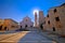 Square and church view in Supetar at sunset