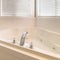 Square Clean bathroom interior of a home with shower stall adjacent to the bathtub