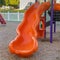 Square Close up of bright and shiny orange slide at a park with childrens playground