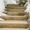 Square Close up of concrete outdoor steps on a slope covered with fresh snow in winter