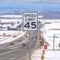 Square Close up of a Speed Limit sign at a highway surrounded with snow in winter