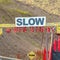 Square Coaster attraction with Slow safety signs in Park City Utah resort in summer