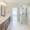 Square Contemporary master bathroom interior with marble tile flooring and a view of a room