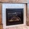 Square crop Interior of living room with fireplace and fitted display and storage cabinet