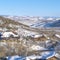 Square crop Luxurious homes in Park City on mountain landscape blanketed with snow in winter