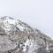 Square crop Provo Canyon mountain with steep rugged slopes dusted with snow in winter